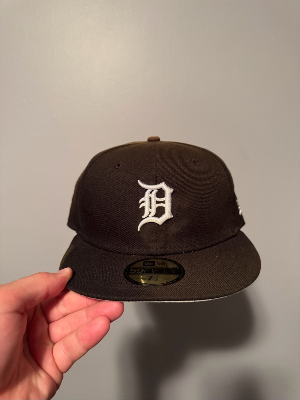 New Era Black Hat with White 'D' Logo